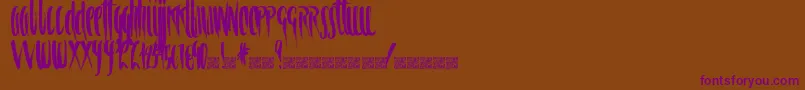 Spiral Font – Purple Fonts on Brown Background