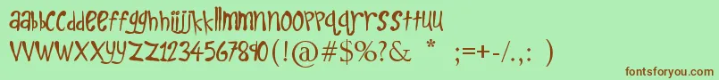 KidsPlay-fontti – ruskeat fontit vihreällä taustalla