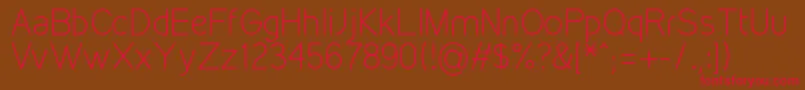 フォントKirvyLight – 赤い文字が茶色の背景にあります。