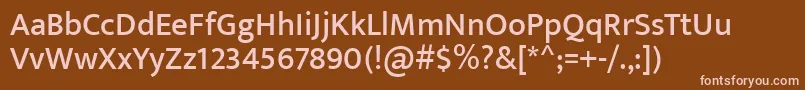 Fonte EkmuktaMedium – fontes rosa em um fundo marrom