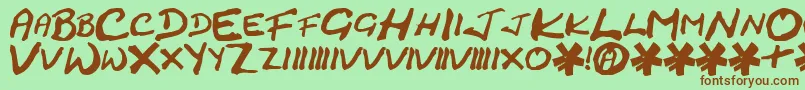 Шрифт CrackedJohnnie – коричневые шрифты на зелёном фоне