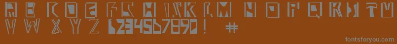 フォントAbstractabomination – 茶色の背景に灰色の文字