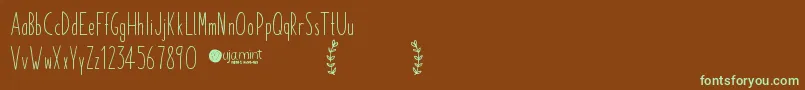 Czcionka PaperdaisyDemo – zielone czcionki na brązowym tle