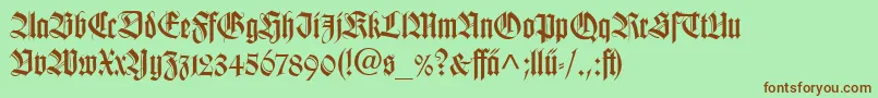 フォントTudorSsi – 緑の背景に茶色のフォント