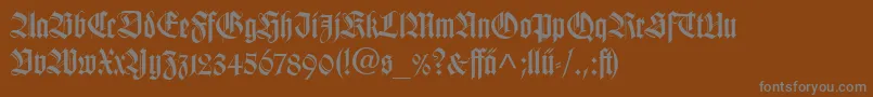 TudorSsi-Schriftart – Graue Schriften auf braunem Hintergrund