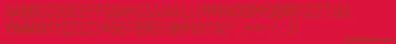 Zomnk Font – Brown Fonts on Red Background