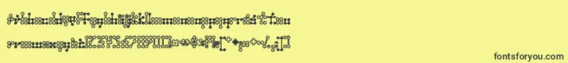 Wednesda-fontti – mustat fontit keltaisella taustalla