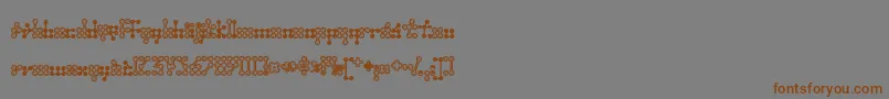 Wednesda-fontti – ruskeat fontit harmaalla taustalla