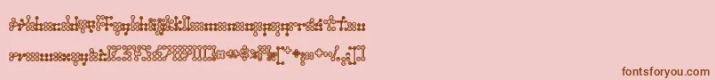 Wednesda-Schriftart – Braune Schriften auf rosa Hintergrund
