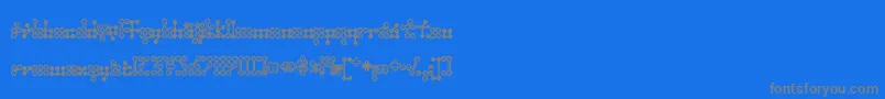 フォントWednesda – 青い背景に灰色の文字