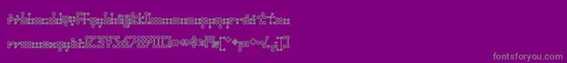 フォントWednesda – 紫の背景に灰色の文字