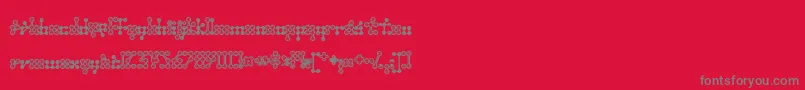 フォントWednesda – 赤い背景に灰色の文字