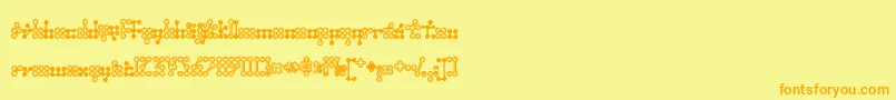 フォントWednesda – オレンジの文字が黄色の背景にあります。