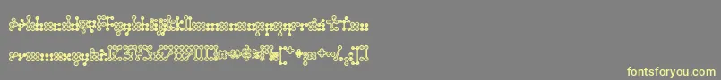 Wednesda-fontti – keltaiset fontit harmaalla taustalla