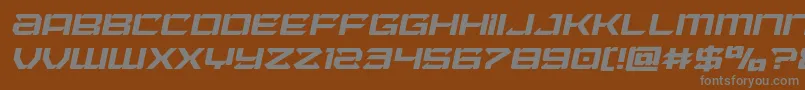 Laserwolfital-fontti – harmaat kirjasimet ruskealla taustalla