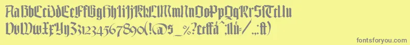 TexturgotischLtDfr-Schriftart – Graue Schriften auf gelbem Hintergrund