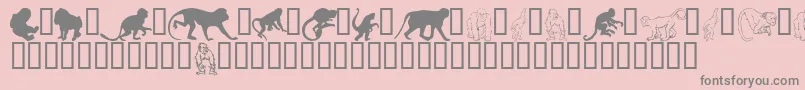 Monkeysdc-fontti – harmaat kirjasimet vaaleanpunaisella taustalla