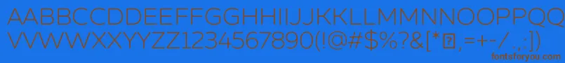 フォントZingsansrustldemoBase – 茶色の文字が青い背景にあります。