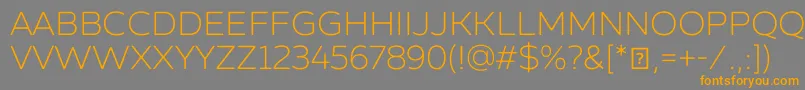 フォントZingsansrustldemoBase – オレンジの文字は灰色の背景にあります。