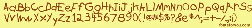 Zachary Font – Brown Fonts on Yellow Background