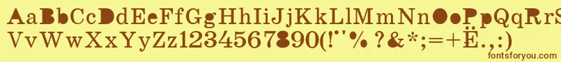 K131 Font – Brown Fonts on Yellow Background