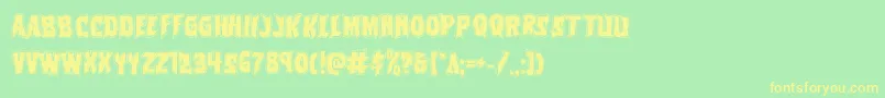 Vorvolakaacad Font – Yellow Fonts on Green Background