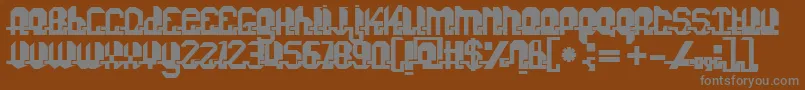 Fonuzzle-Schriftart – Graue Schriften auf braunem Hintergrund