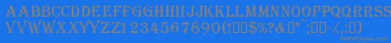 フォントGazettecapsssk – 青い背景に灰色の文字