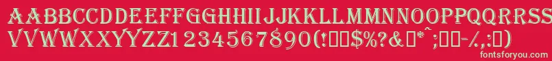 フォントGazettecapsssk – 赤い背景に緑の文字