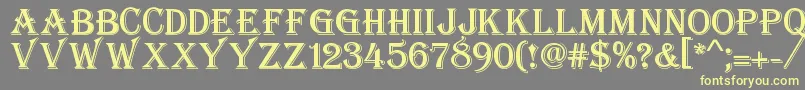 Stupido-Schriftart – Gelbe Schriften auf grauem Hintergrund