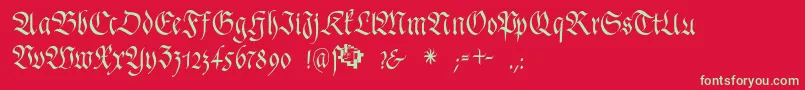 フォントFrakturafonteriaSlim – 赤い背景に緑の文字