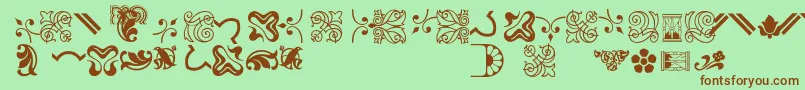 Bordersornament3-fontti – ruskeat fontit vihreällä taustalla