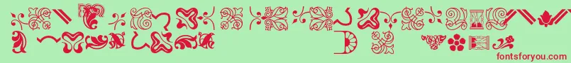 Bordersornament3-Schriftart – Rote Schriften auf grünem Hintergrund