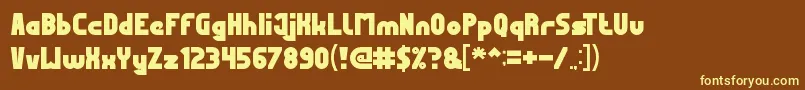 MostFamous-fontti – keltaiset fontit ruskealla taustalla