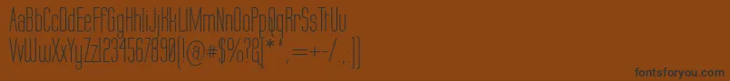 フォントLabtop – 黒い文字が茶色の背景にあります