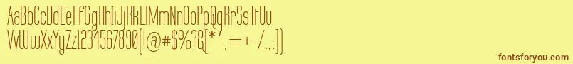 フォントLabtop – 茶色の文字が黄色の背景にあります。