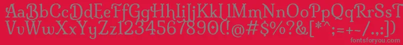 MilongaRegular-Schriftart – Graue Schriften auf rotem Hintergrund