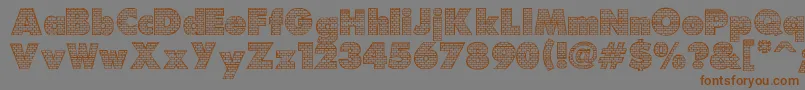 フォントBrick – 茶色の文字が灰色の背景にあります。