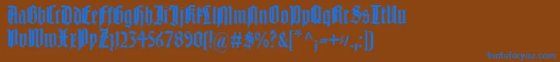 Liturgisch-fontti – siniset fontit ruskealla taustalla
