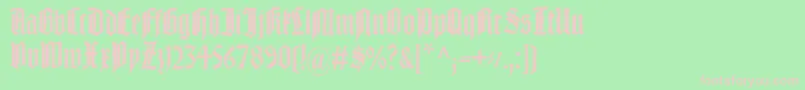 Liturgisch-fontti – vaaleanpunaiset fontit vihreällä taustalla
