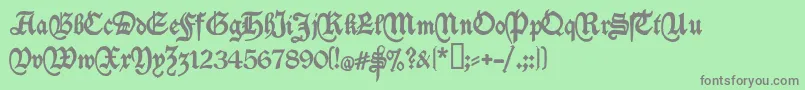 フォントDeutschische – 緑の背景に灰色の文字