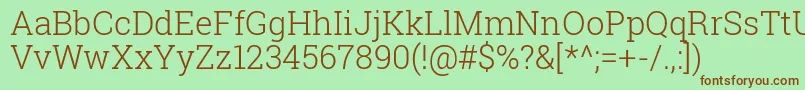 RobotoSlabLight-fontti – ruskeat fontit vihreällä taustalla
