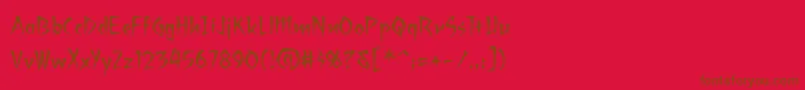 Fonte Ragingredlotus – fontes marrons em um fundo vermelho