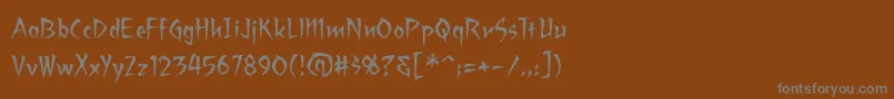 フォントRagingredlotus – 茶色の背景に灰色の文字