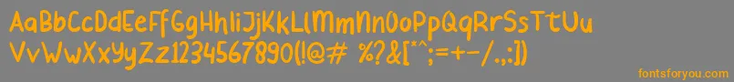 フォントBeliday – オレンジの文字は灰色の背景にあります。
