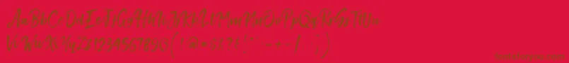 Fonte SmithenScript – fontes marrons em um fundo vermelho