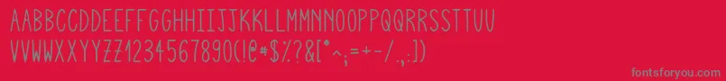 Squigglyasta-Schriftart – Graue Schriften auf rotem Hintergrund