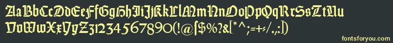 フォントDsweissGotisch – 黒い背景に黄色の文字
