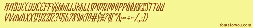 フォントXiphosCondensedItalic – 茶色の文字が黄色の背景にあります。