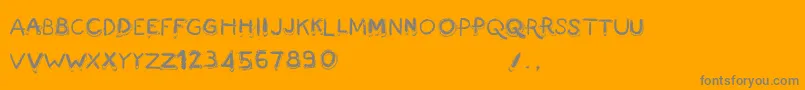 Czcionka FingermadeV2 – szare czcionki na pomarańczowym tle